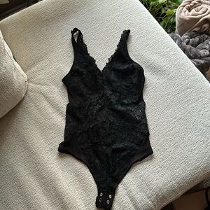 Black body suit lace used once